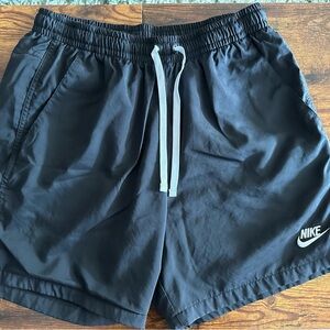 Nike Athletic shorts. Men’s black Nike athletic shorts with white accents